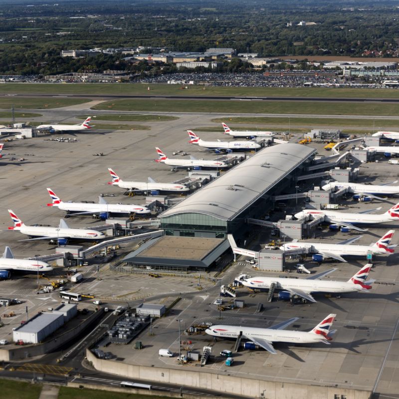 aerial photo of planes at Heathrow terminal