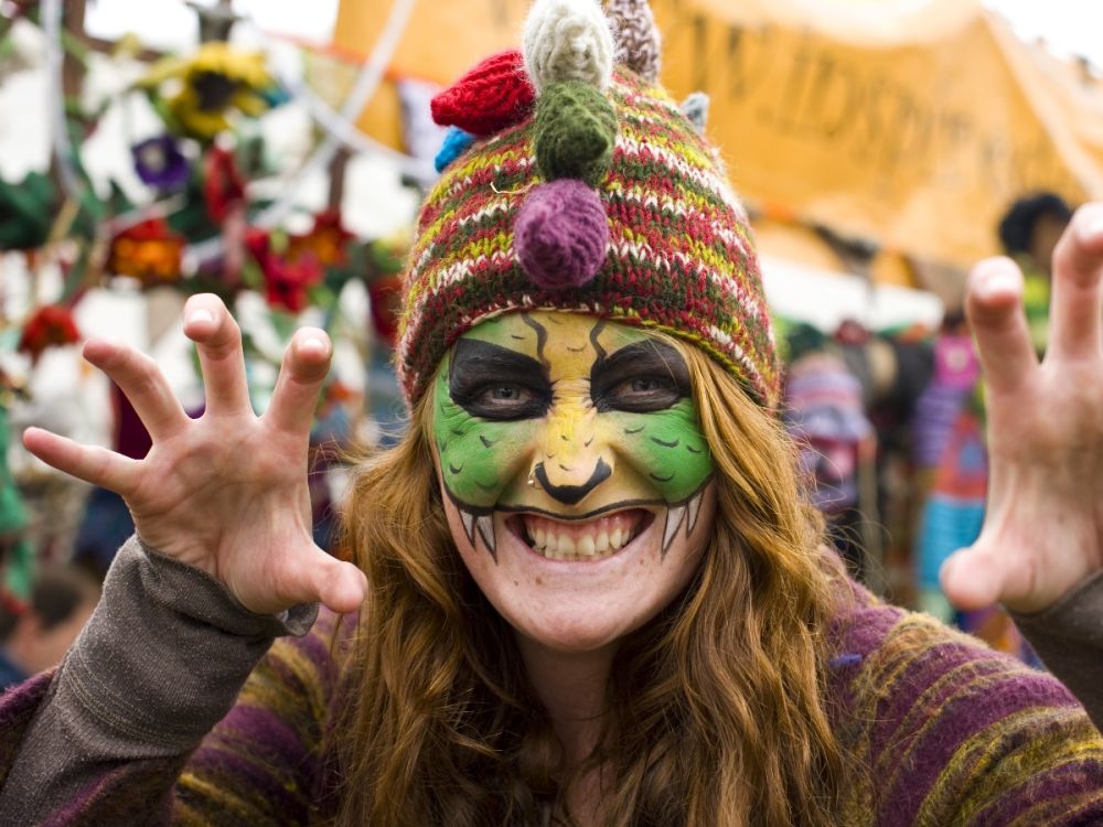 Woman in face paint at a festival